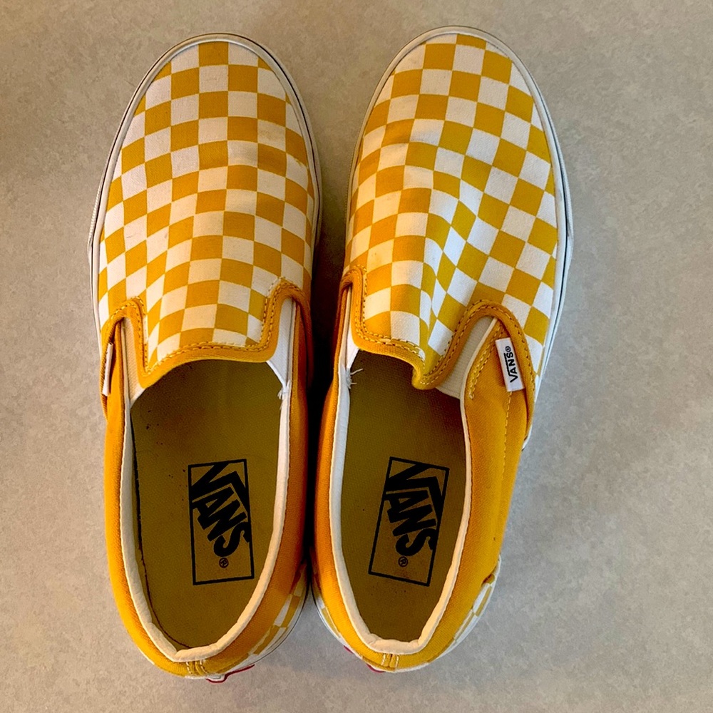 Yellow checker vans.
